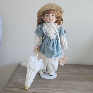 Vintage 1986 Brinn’s Bloomer Girl Story Porcelain Doll with Parasol & Stand